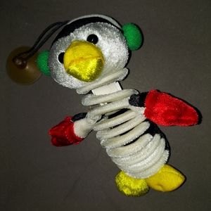 Penguin Slinky window decor